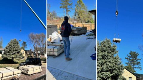 Crane Hoisting Giant Stones For Backyard Hardscaping Project