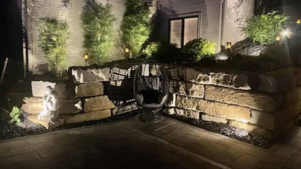 Outdoor Lights Accenting Stone And Side Of Home