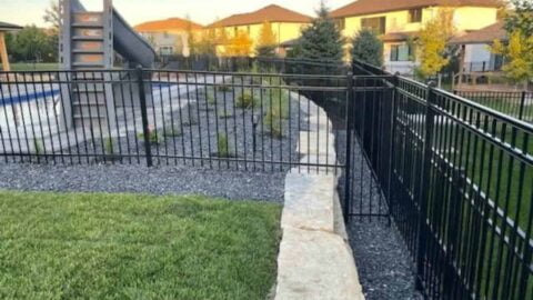 Retaining Wall With River Rock Around Pool